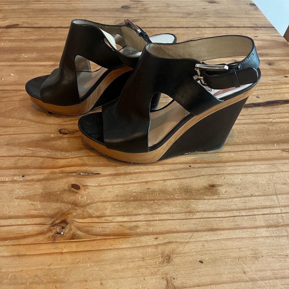 $22 Michael Kors Women's Black Wedge Sandals.